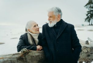 elderly couple looking at each other